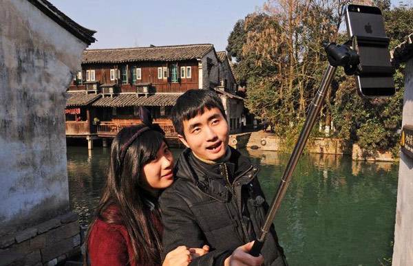 China's 2014 tourism revenue hits 3.38 trillion