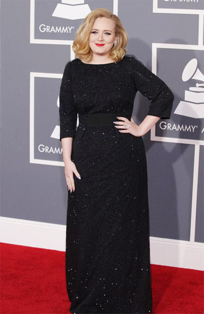 Adele 'buys house with boyfriend'