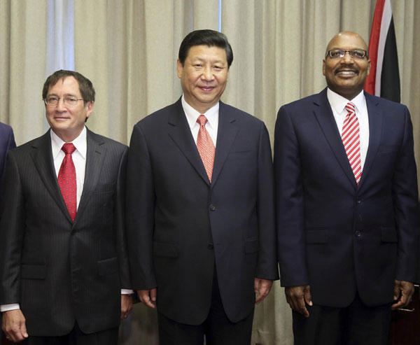 President Xi meets Trinidad and Tobago's Senate President Timothy Hamel-Smith, left, and Speaker of House of Representatives Wade Mark in Port of Spain, Trinidad and Tobago, June 1, 2013. Xi calls for legislative exchanges with Trinidad and Tobago