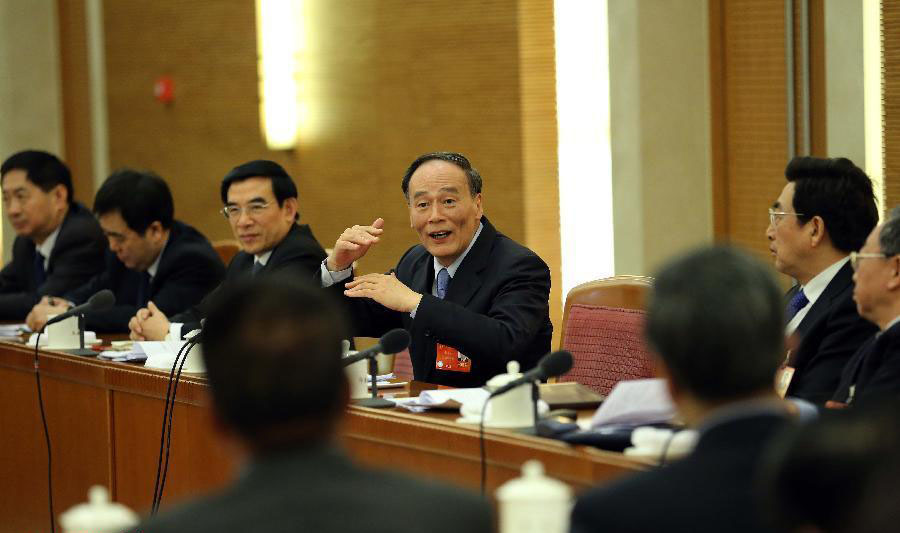 Chinese leaders join panel discussions
