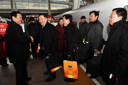 Members of CPPCC arrive in Beijing for session 