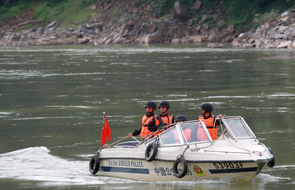 The Chinese detachment of a four-nation armed Mekong River patrol was deployed on Friday as China, Laos, Myanmar and Thailand established the law enforcement command center for the units in Yunnan province. Chinese police patrol deployed in border port