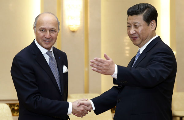 President Xi Jinping meets visiting French Foreign Minister Laurent Fabius at the Great Hall of the People in Beijing on Friday. Photo by FENG YONGBIN / CHINA DAILY Xi urges close relations with France