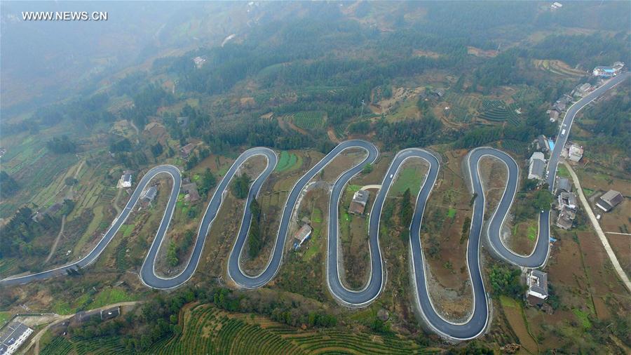 Winding road looks like jade belt around mountain in Central China