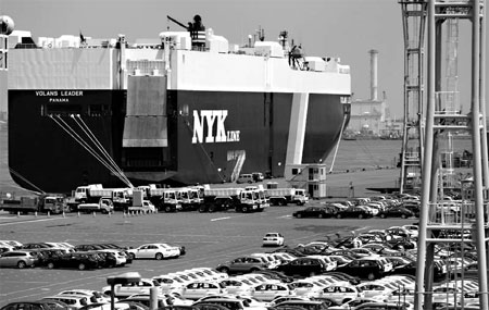 Japan's export slump eases slightly in March