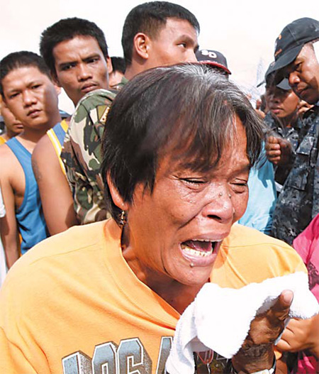 Hunt for Philippine fishermen after killer typhoon continues