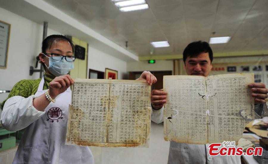 Great efforts needed to restore ancient books