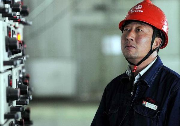 尤天軍：26年執著堅守　苦修成“工人教授”