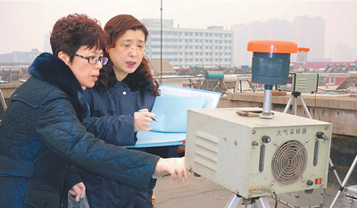 新春走基層 PM2.5監測 三分法得出空氣質量報告