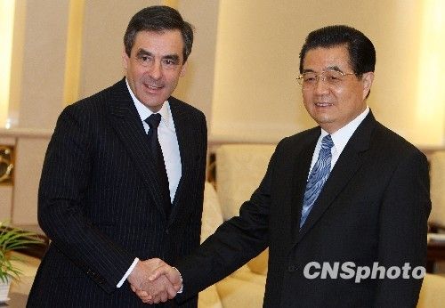 胡錦濤會晤法國總理菲永 中法關(guān)系回暖