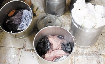 廣州:偏僻小黑屋造出“英國皇室御用食品”(圖)