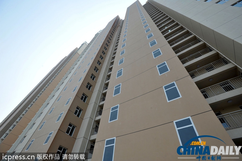 青島一經(jīng)適房小區(qū)墻體上畫假窗 遭網(wǎng)友調(diào)侃“神筆馬良”