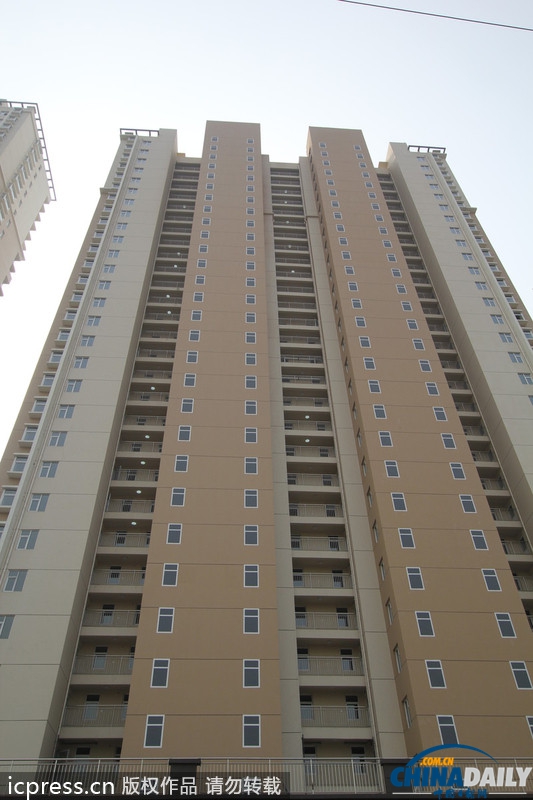 青島一經(jīng)適房小區(qū)墻體上畫假窗 遭網(wǎng)友調(diào)侃“神筆馬良”