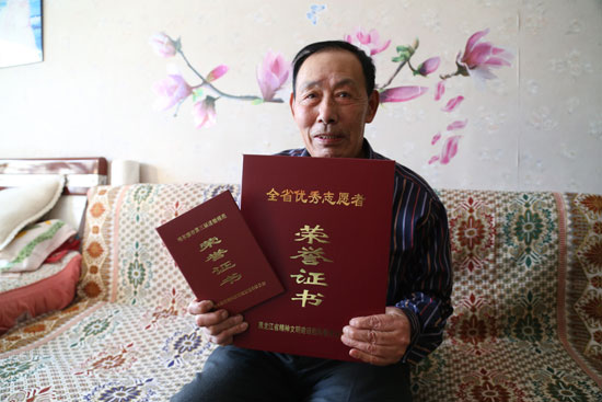 李俊熠：20年持之以恒 雷鋒戰(zhàn)友傳承“雷鋒精神”