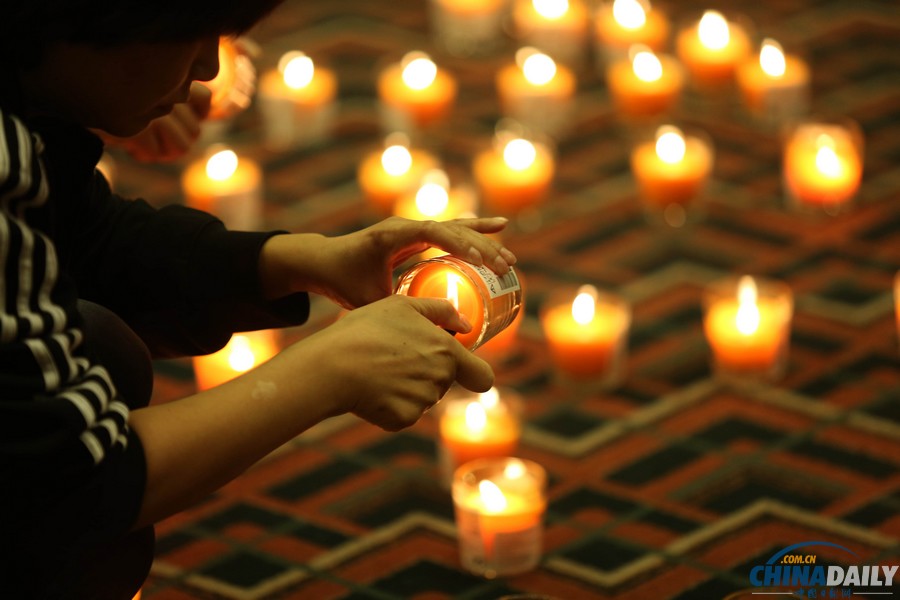 馬航MH370失聯客機整月 家屬為親人祈福守望