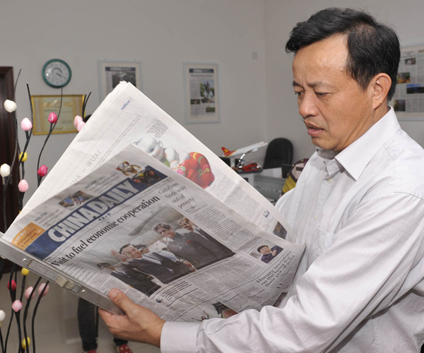 海口市委常委、宣傳部長吳川祝走訪中國日報海南記者站