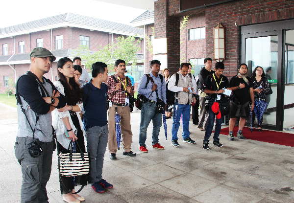 亞洲主流媒體采訪團聚焦煙臺生態農村和旅游勝地