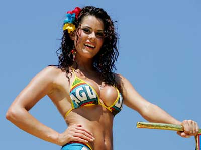 A Colombian woman dances during the first day of carnival in Barranquilla, February 5 2005. Thousands of people are in the Caribbean city to celebrate carnival festivities.