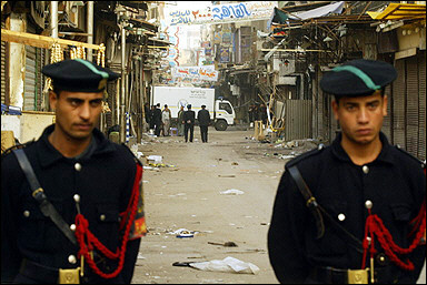 Egyptian policemen secure the site of a bomb blast at the Al-Moski bazaar in Cairo on April 8. Egyptian authorities have arrested three more men over their suspected roles in the deadly blast that rocked a central Cairo bazaar, while a fourth suspect escaped, the interior ministry said.(AFP/File) 