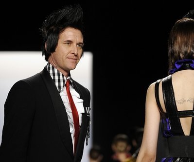 Henderson sews up top prize on 'Project Runway'