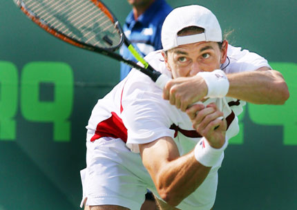 Simon Greul of Germany eyes a low volley during his match against Andy Roddick of the U.S. at the Nasdaq-100 Open tennis tournament in Key Biscayne, Florida March 28, 2006.