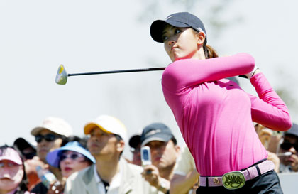 American golfer Michelle Wie looks at her driver shot on the 5th hole of the SK Telecom Open 2006 golf tournament at the Sky 72 Golf Club in Inchon, west of Seoul, May 7, 2006.