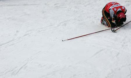 Germany's Ronny Ackermann reacts after finishing the men's individual 15 km race and winning the Nordic Combined event at the Nordic World Championships in Sapporo, northern Japan March 3, 2007.