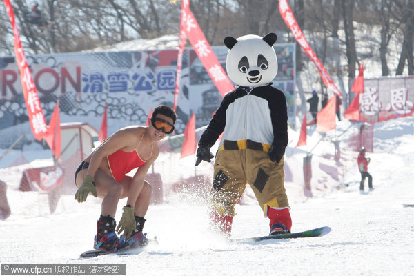 About 1,000 people took part in the event which requires participants to ski in their underwear or self-designed outfits. Underwear skiers enjoy fun and games in snow
