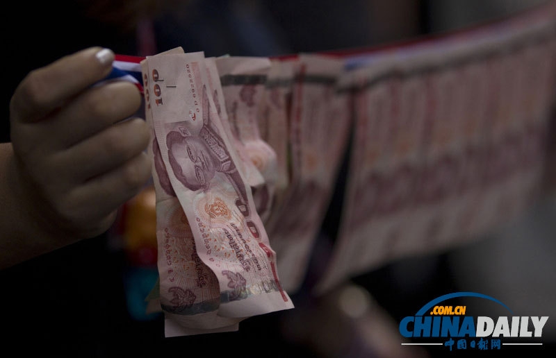 泰反對派陣營日漸壯大 捐款數到手軟要用麻袋裝