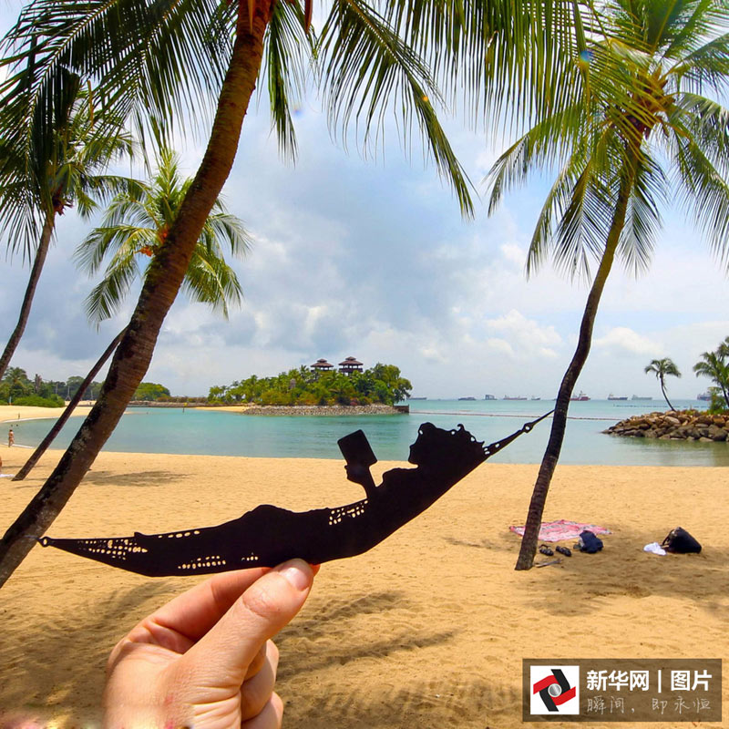 藝術家剪紙錯位攝影 度假勝地變創意作品趣味十足(組圖)