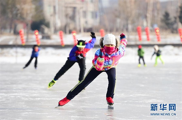 Ice skating on frozen Xilin Lake