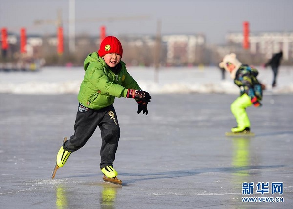 Ice skating on frozen Xilin Lake
