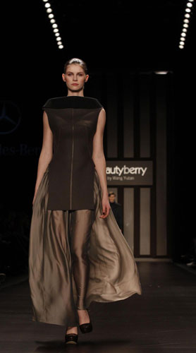 A model presents a creation of Beautyberry by Wang Yutao at the Berlin Fashion Week Autumn/Winter 2012 in Berlin January 20, 2012. Photos: Berlin Fashion Week