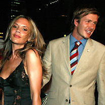 England soccer captain David Beckham (R) and his wife Victoria, attend a party in Singapore in this July 6, 2005 file photo. 