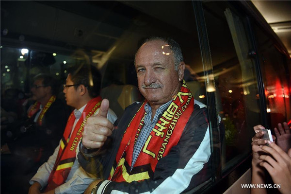 Evergrande's new coach Scolari arrives in Guangzhou