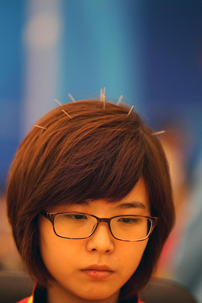 圍棋盤(pán)外出狠招 李瑟娥變身“天線寶寶”