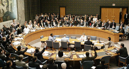 Members of the U.N. Security Council vote at the United Nations in New York on a resolution calling for an end to the conflict in Lebanon August 11, 2006. The U.N. Security Council adopted unanimously on Friday a resolution calling for an end to fighting between Israel and Lebanon's Hizbollah and authorizing up to 15,000 new peacekeepers to enforce it.