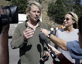 Bill and Dwan Twyford talk about a text message sent from their 15-year-old son, Billy, from inside Plate Canyon High School when a shooting took place in the school in Bailey, Colo. on Wednesday, Sept. 27, 2006.
