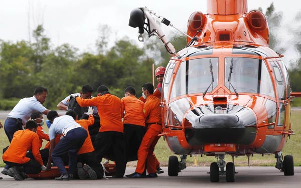 AirAsia victim with life jacket raises questions about plane's last moments
