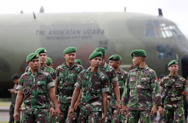 AirAsia victim with life jacket raises questions about plane's last moments